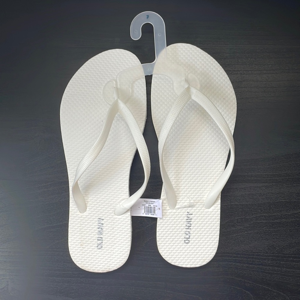 Old navy white flip flops. Women 7